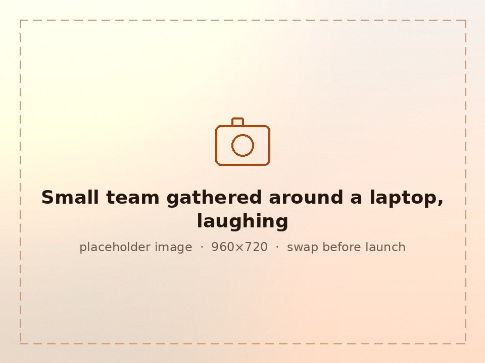 Three colleagues gathered around a laptop in a bright office, talking through a customer question and smiling.
